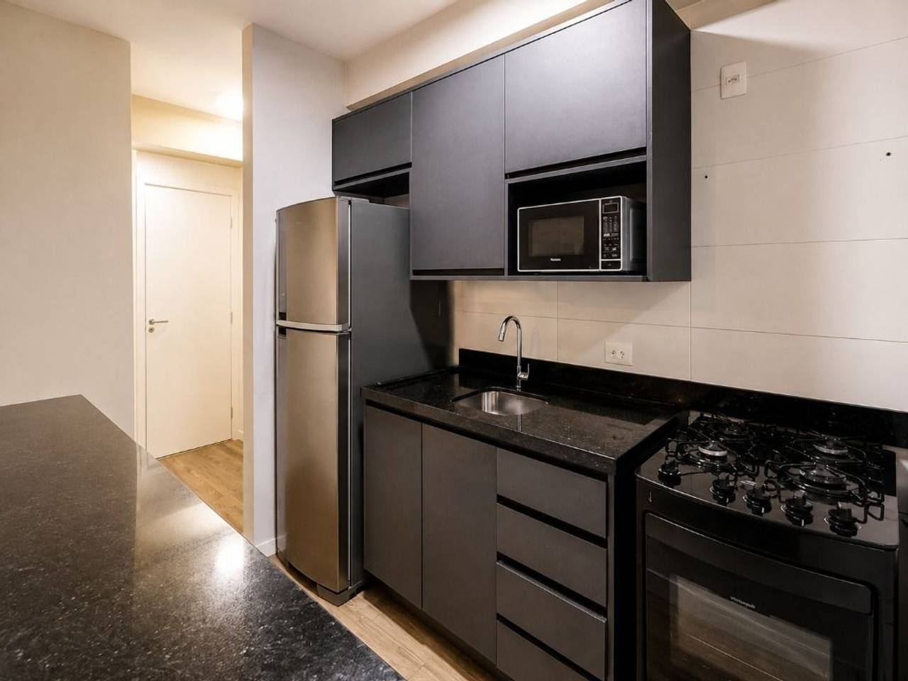 Sala de estar apartamento à venda em Condominio Acqua Park Alphaville, Barueri — 1 suíte, 54 m² — imagem 2 de 20