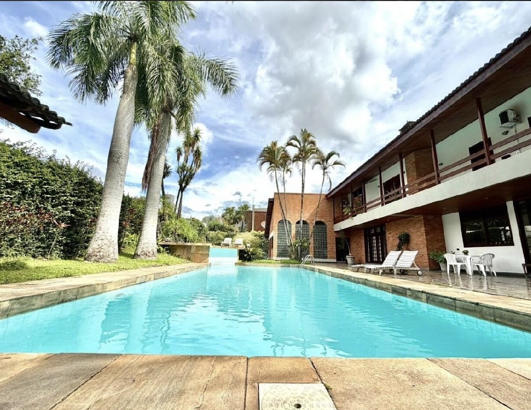 Piscina e área externa casa à venda em Alphaville Residencial 1, Alphaville, Barueri — 4 suítes, 1120 m² — imagem 5 de 5