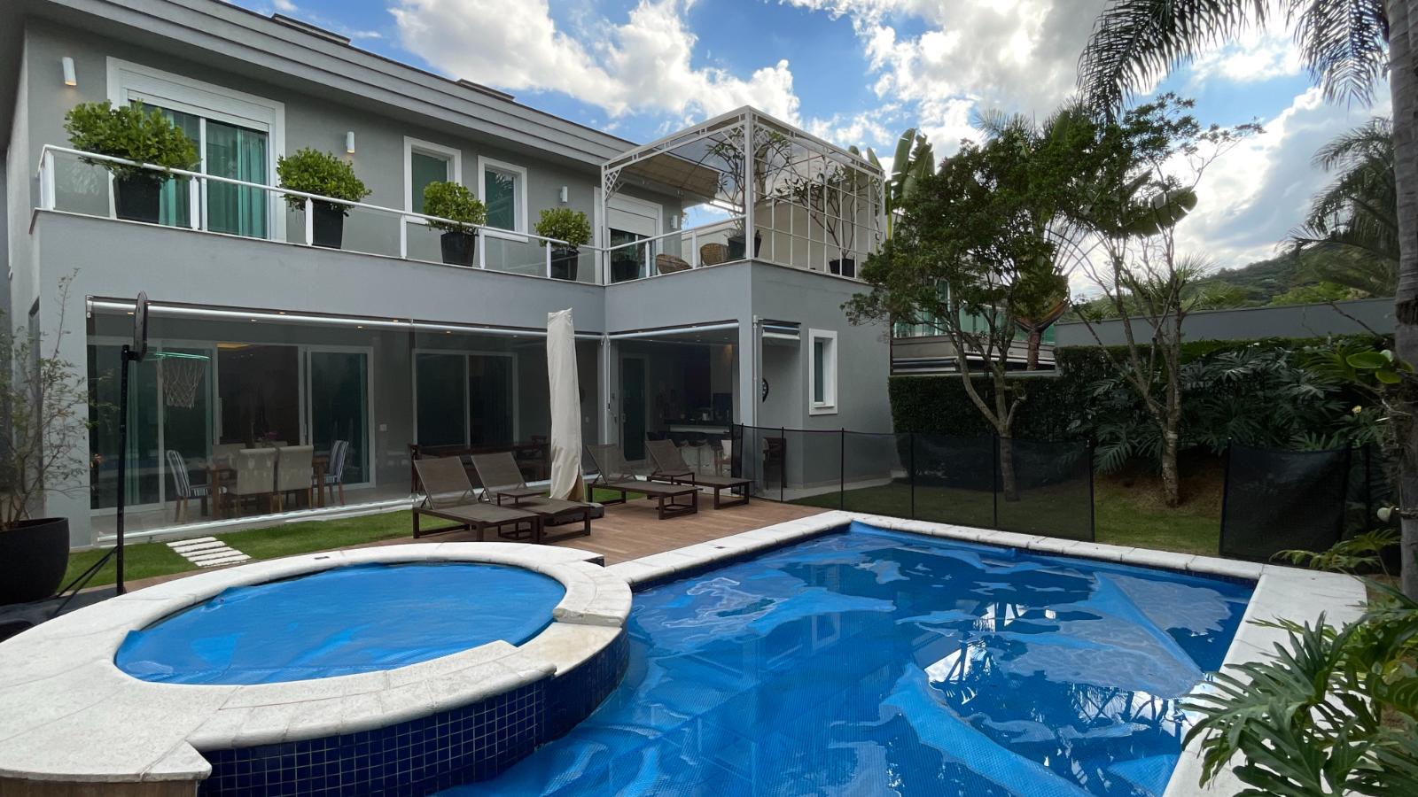 Fachada casa à venda em Residencial Tambore 10 , Alphaville, Santana de Parnaíba — 4 suítes, 411 m² — imagem 1 de 43