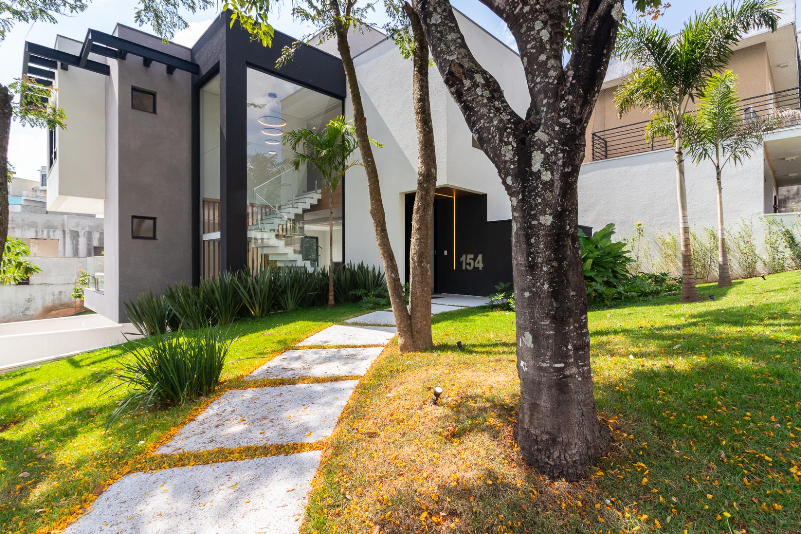 Sala de estar casa à venda em New Ville, Alphaville, Santana de Parnaíba — 4 suítes, 355 m² — imagem 2 de 32