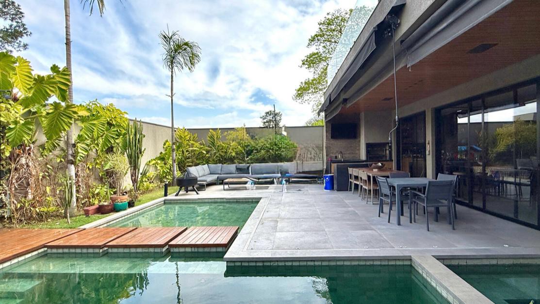 Área de convivência casa à venda em Alphaville Residencial 2, Alphaville, Barueri — 4 suítes, 560 m² — imagem 6 de 17