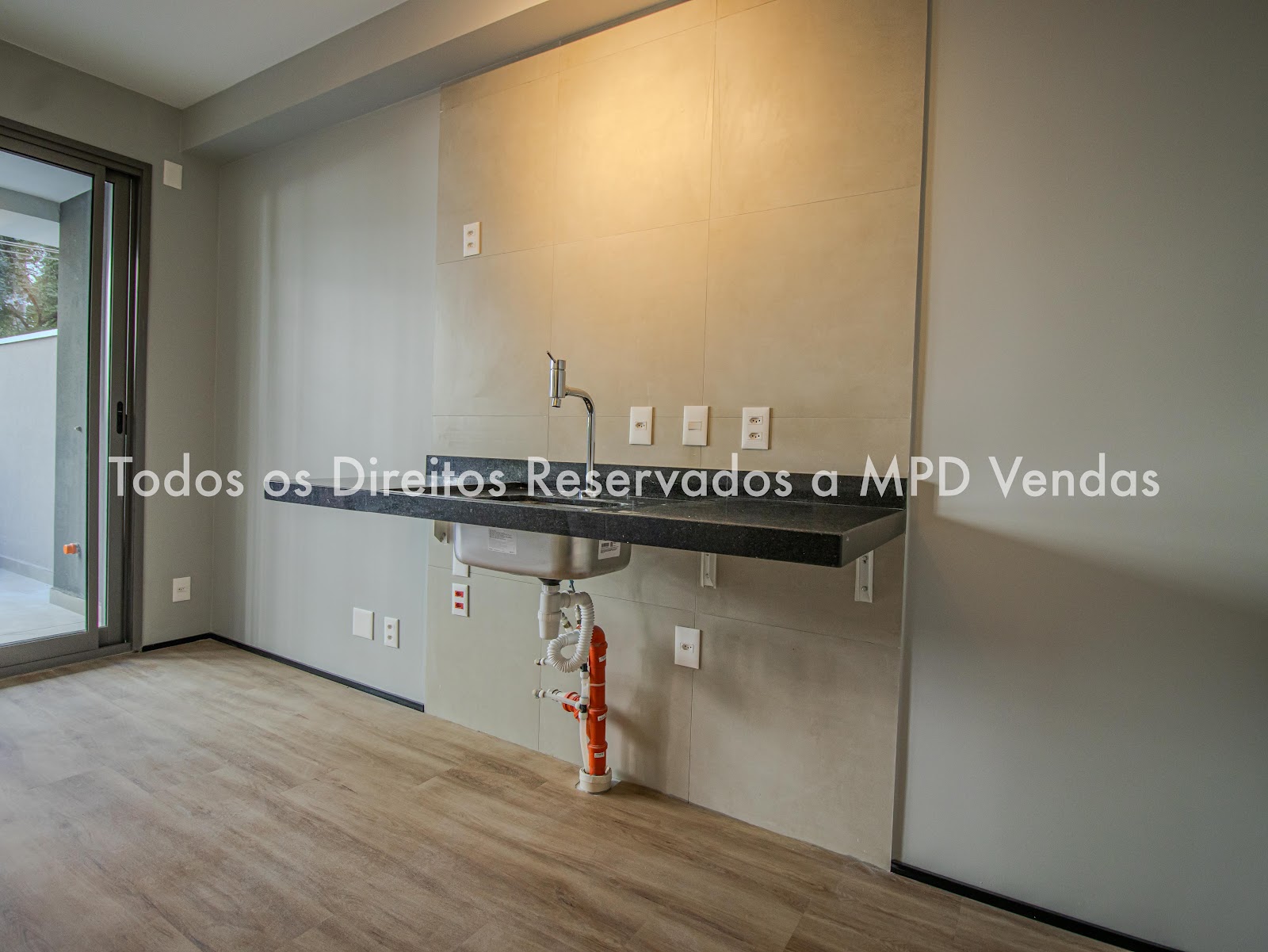 Sala de estar studio à venda em Moema, São Paulo — 1 suíte, 47 m² — imagem 2 de 12