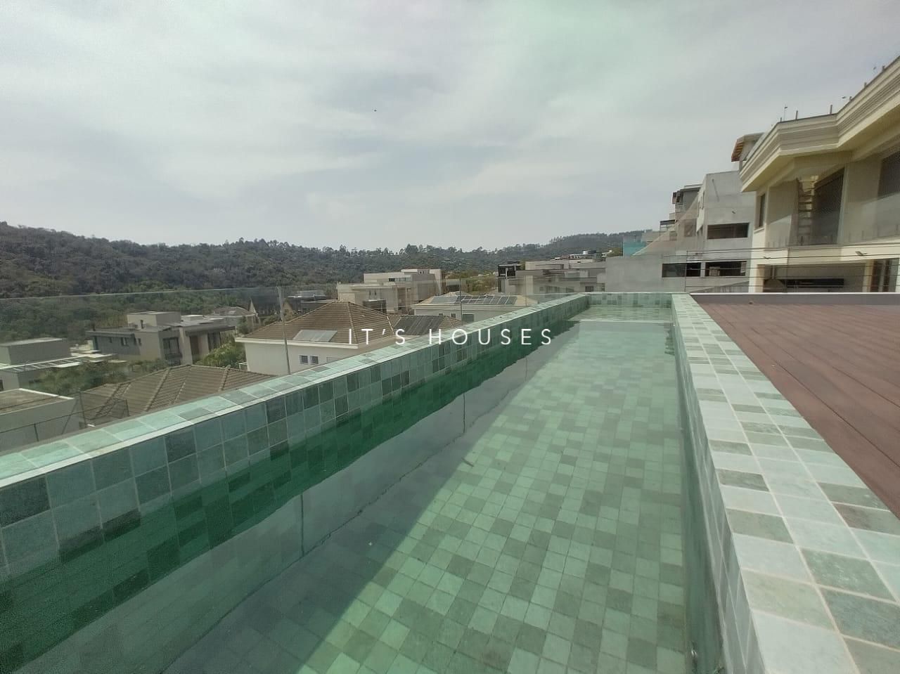 Fachada casa à venda em Genesis 2, Alphaville, Santana de Parnaíba — 2 suítes, 490 m² — imagem 1 de 37