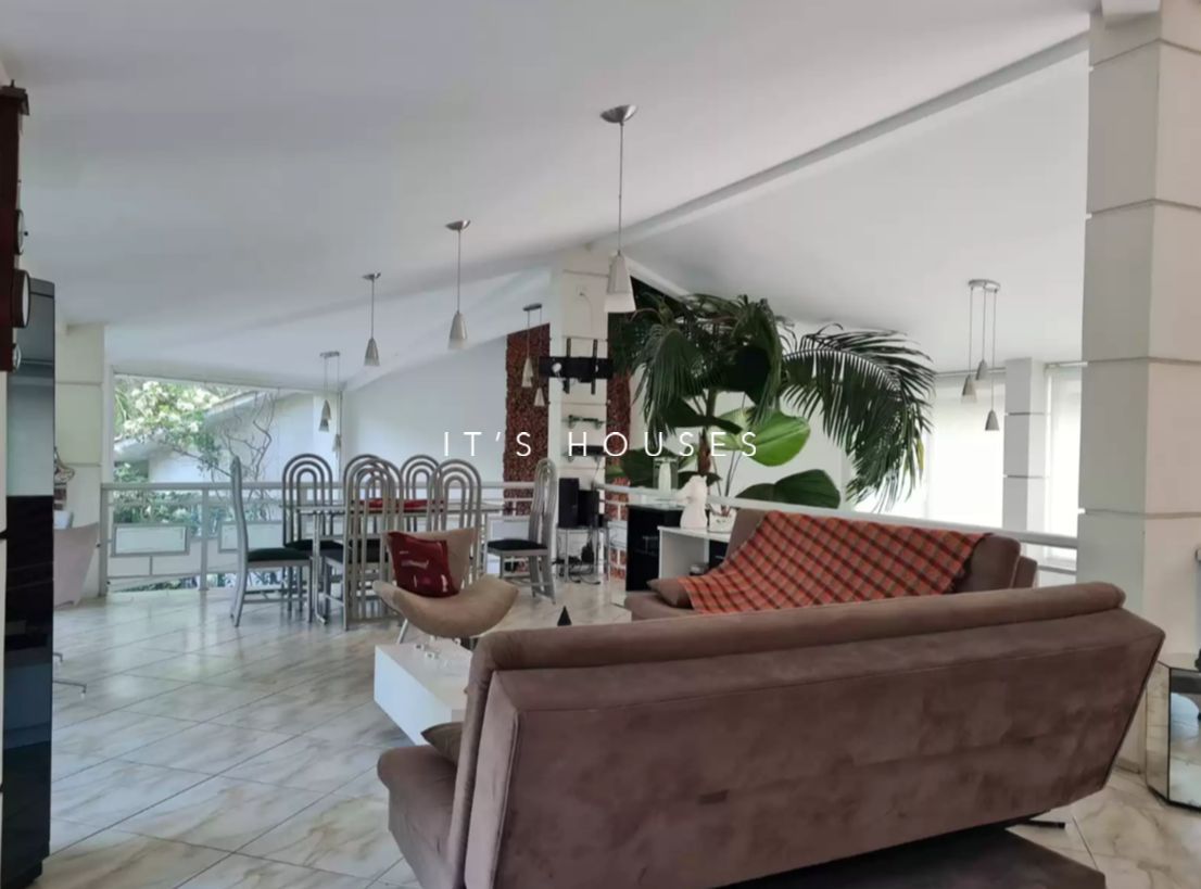 Cozinha e área gourmet casa à venda em Residencial Tambore 1, Alphaville, Barueri — 4 suítes, 1947 m² — imagem 3 de 8